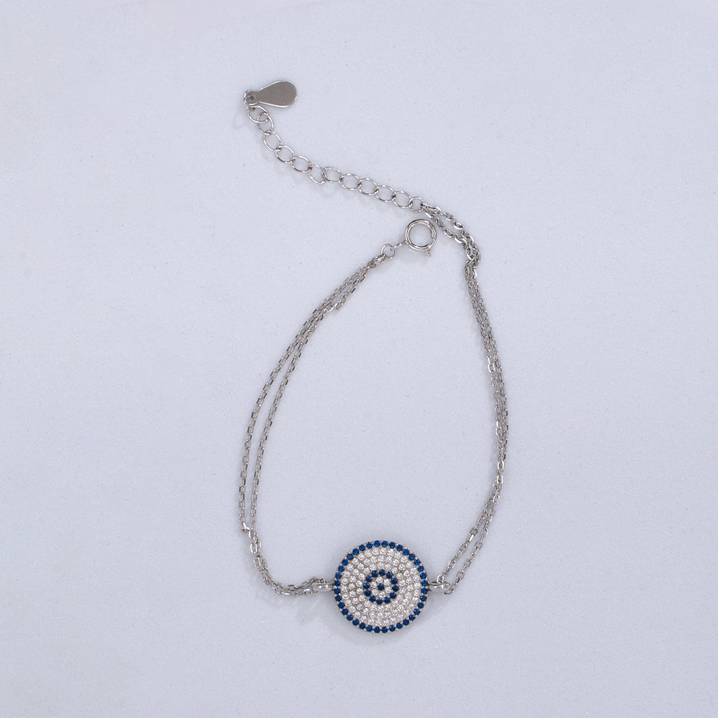 Crafted in Sterling Silver with radiant Blue & White Diamonds