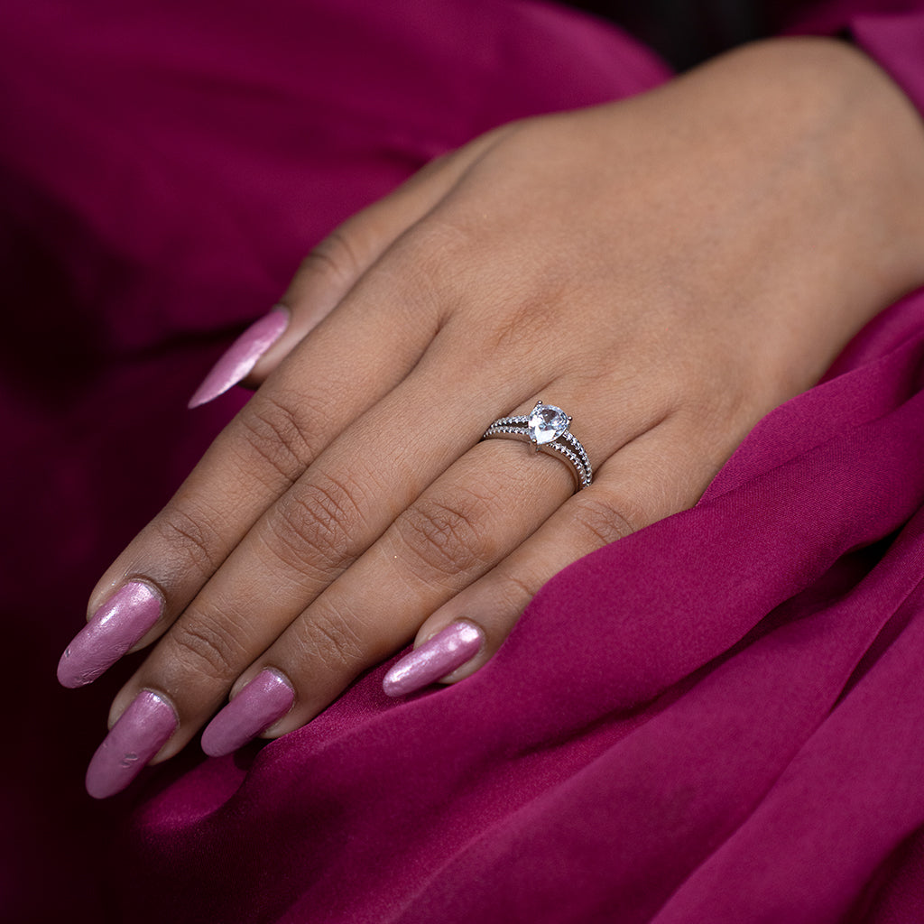 Silver Ring With Teardrop Shaped Diamonds