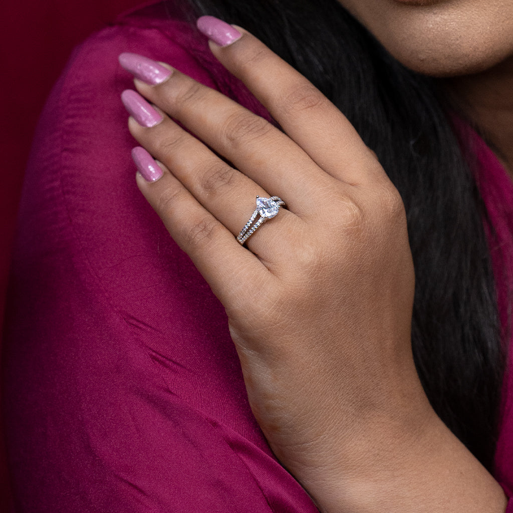Silver Ring With Teardrop Shaped Diamonds