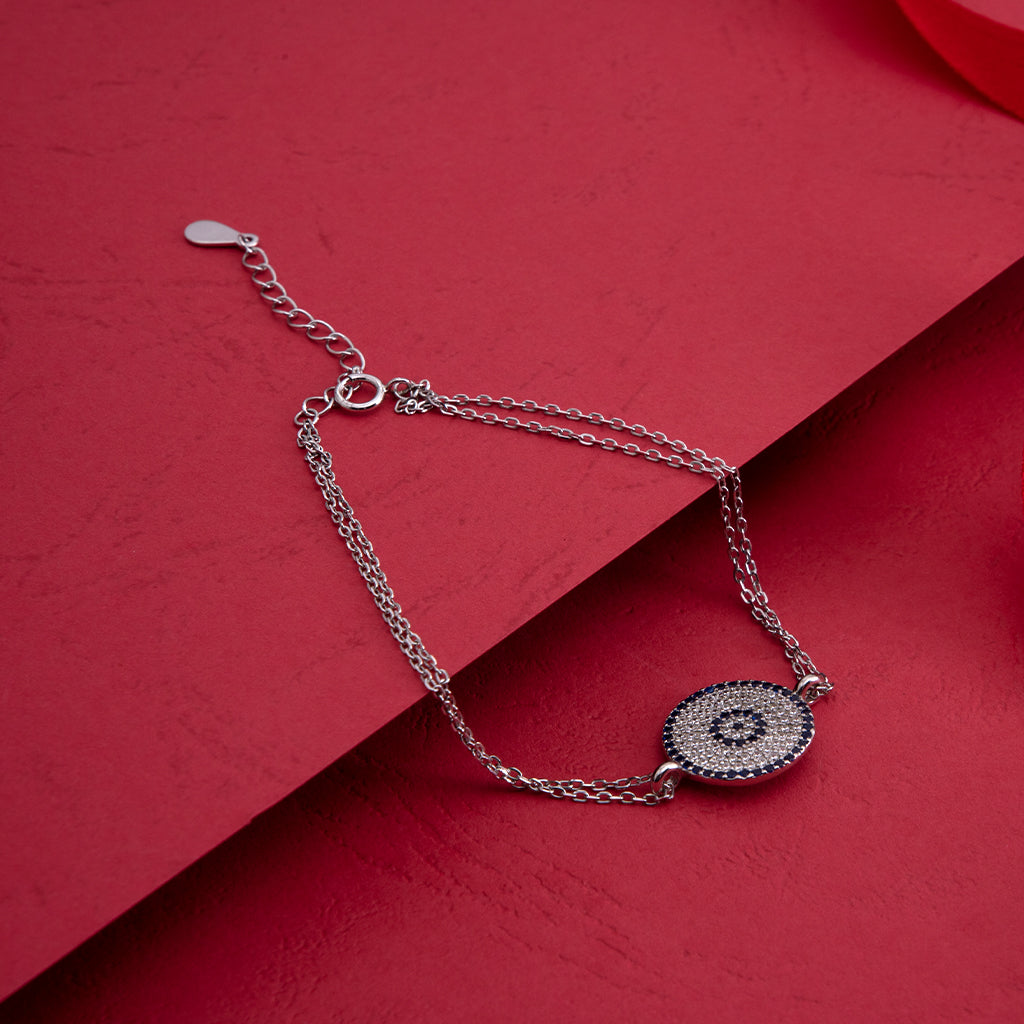 Crafted in Sterling Silver with radiant Blue & White Diamonds