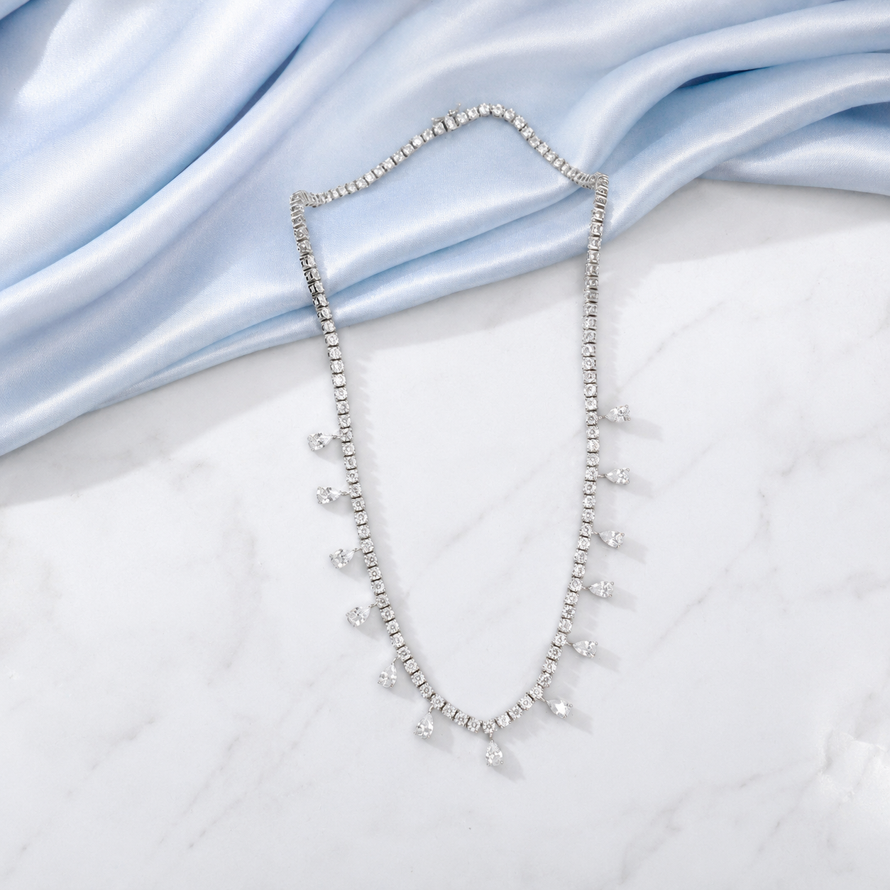 Silver Necklace featuring Solitaires in Pear shaped Design