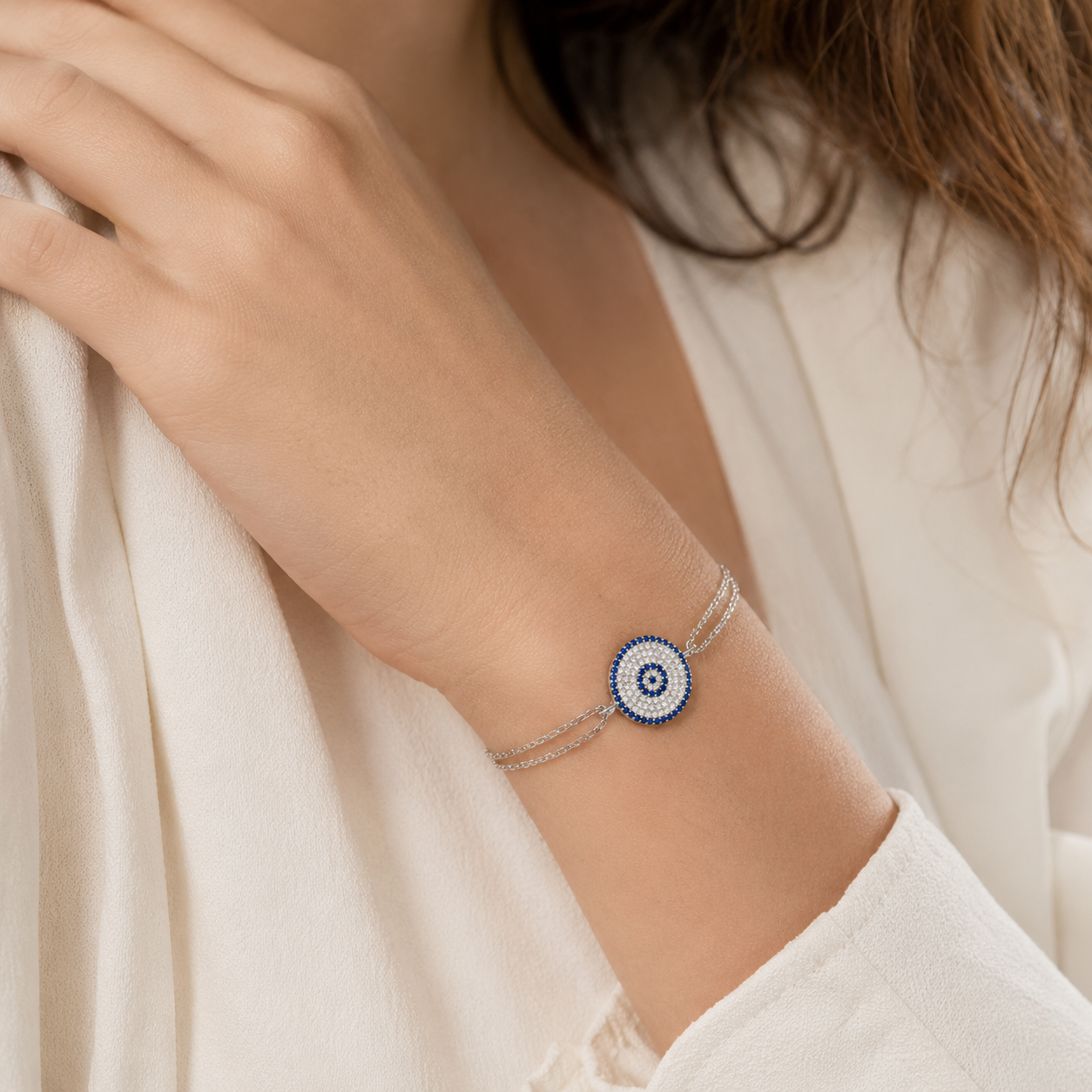 Crafted in Sterling Silver with radiant Blue & White Diamonds
