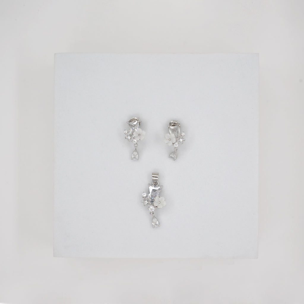 Silver Pendant Set With Emerald Cut Diamonds