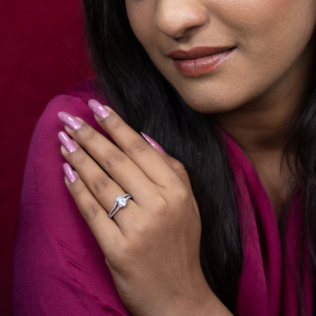 Silver Ring With Teardrop Shaped Diamonds